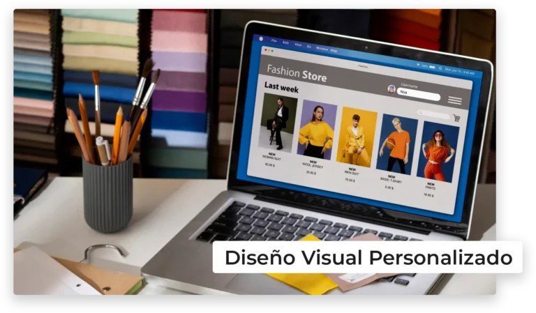 Espacio de trabajo diseño web con laptop mostrando un sitio web